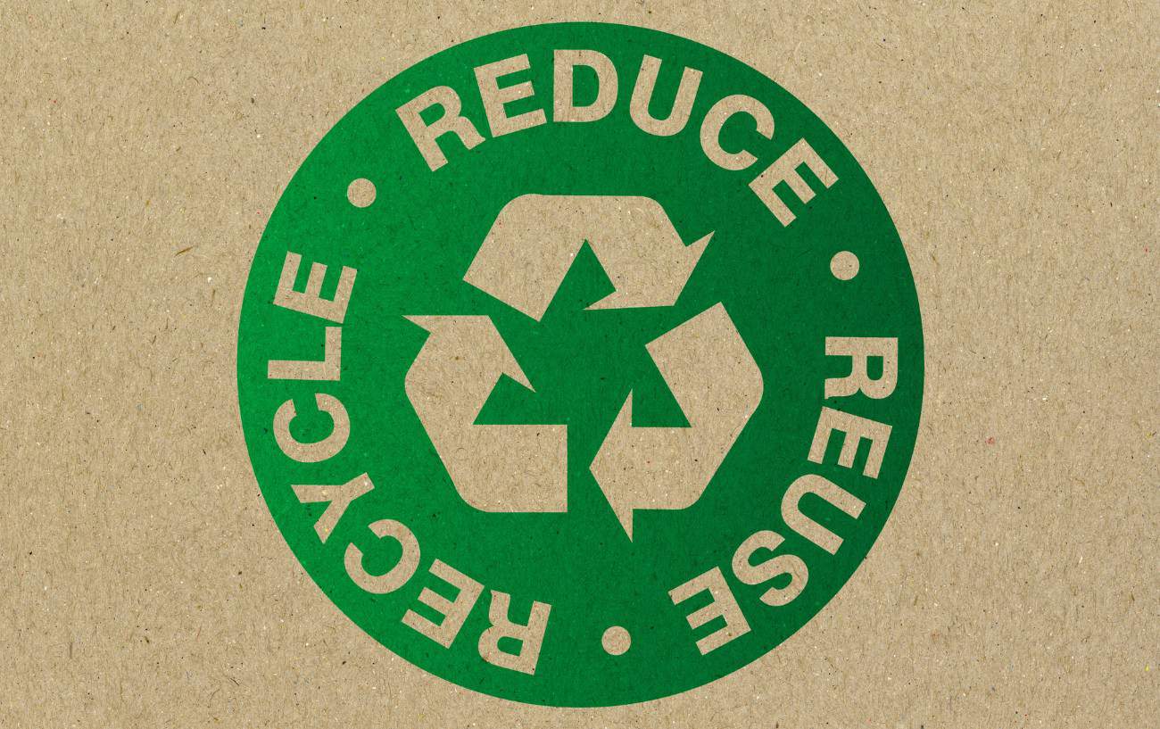 El emblema de reducir, reutilizar, reciclar.